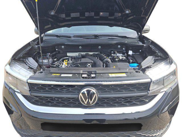 used 2024 Volkswagen Taos car, priced at $22,500