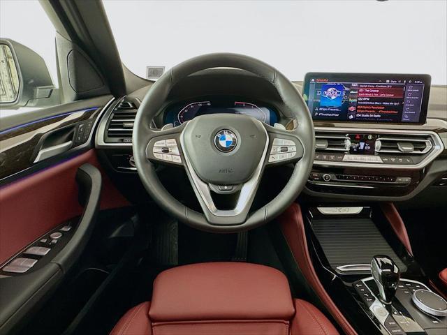 used 2025 BMW X4 car, priced at $52,789