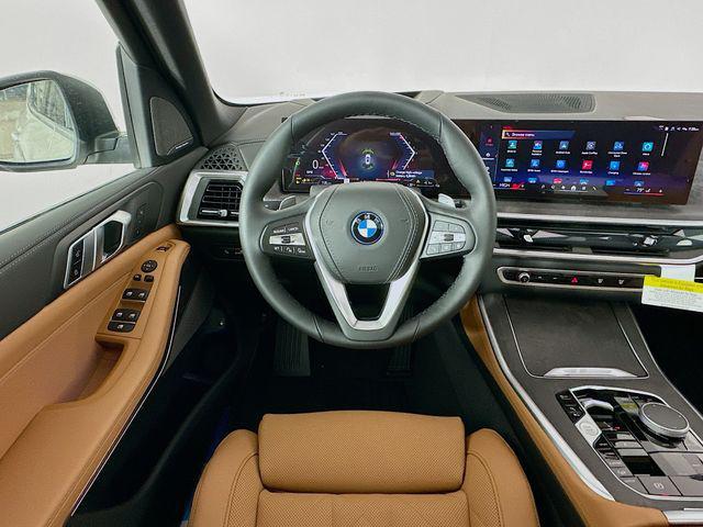 new 2025 BMW X5 PHEV car, priced at $77,560