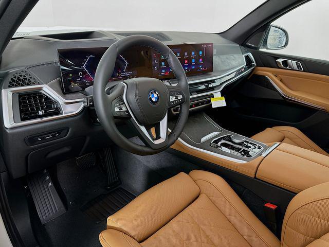 new 2025 BMW X5 PHEV car, priced at $77,560