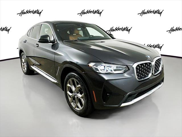 used 2024 BMW X4 car, priced at $49,010