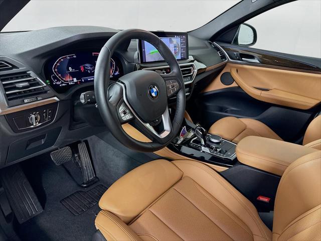 used 2024 BMW X4 car, priced at $49,010