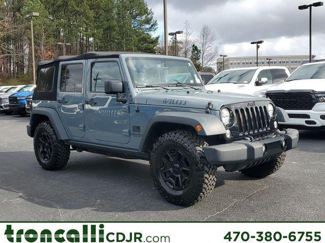 used 2014 Jeep Wrangler Unlimited car, priced at $17,449