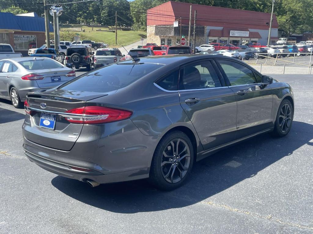 used 2018 Ford Fusion car, priced at $7,647