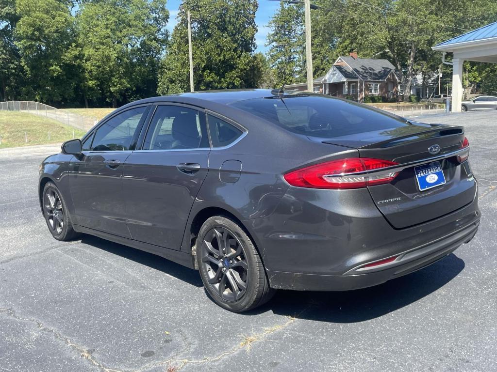 used 2018 Ford Fusion car, priced at $7,647
