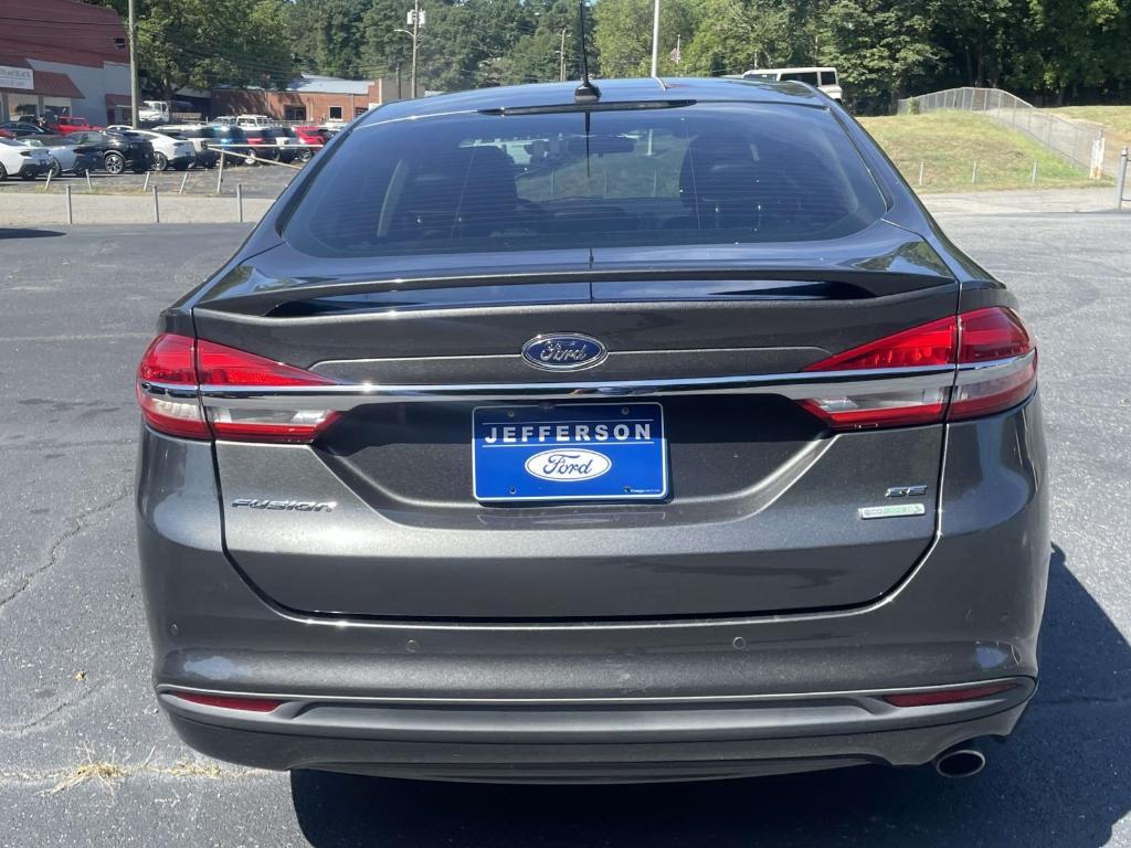used 2018 Ford Fusion car, priced at $7,647