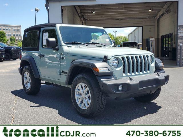 used 2023 Jeep Wrangler car, priced at $28,291