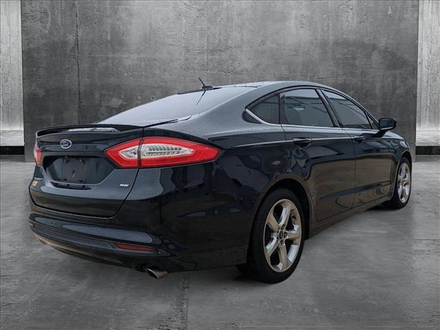 used 2014 Ford Fusion car, priced at $7,991