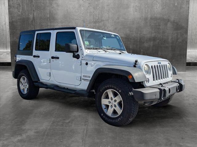 used 2014 Jeep Wrangler Unlimited car, priced at $18,991