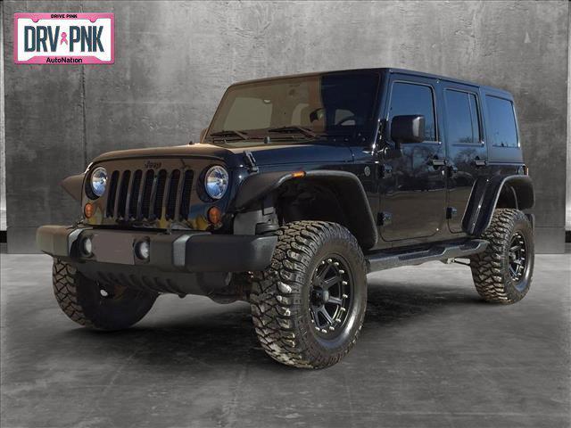 used 2013 Jeep Wrangler Unlimited car, priced at $15,991