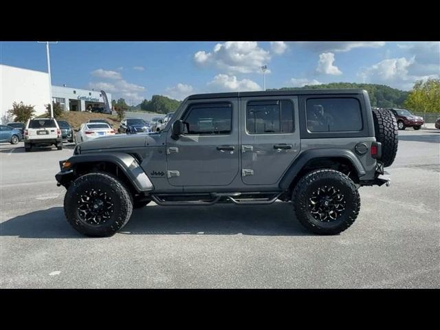 used 2023 Jeep Wrangler car, priced at $37,100