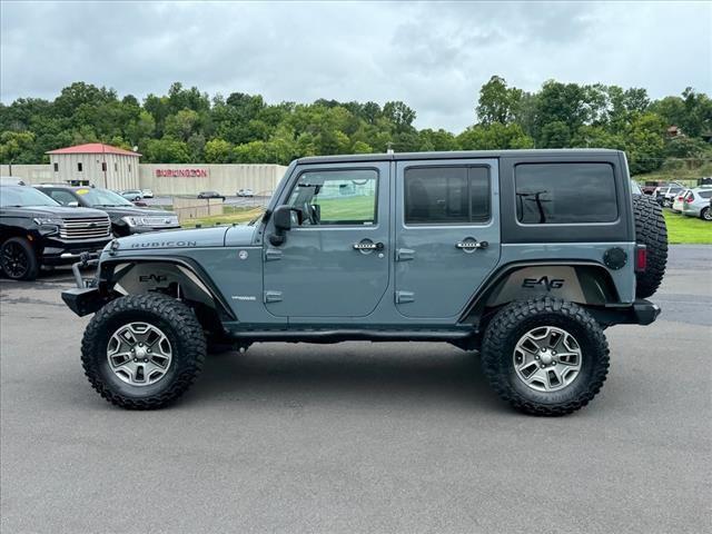 used 2014 Jeep Wrangler Unlimited car, priced at $19,911