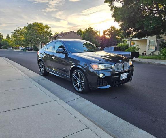 used 2016 BMW X4 car, priced at $13,450