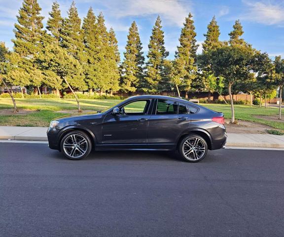 used 2016 BMW X4 car, priced at $13,450