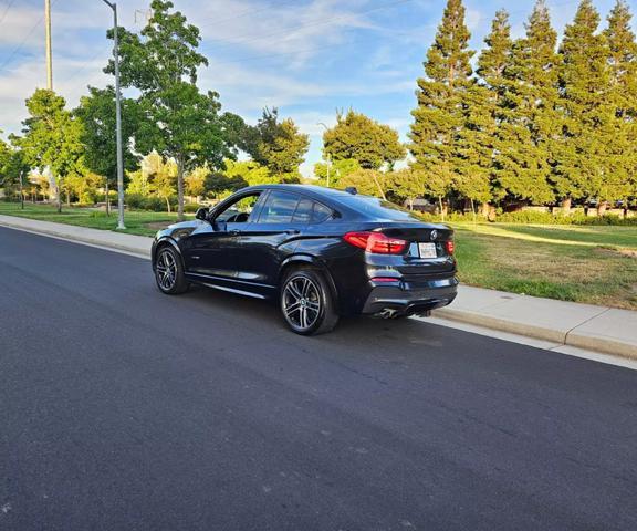 used 2016 BMW X4 car, priced at $13,450