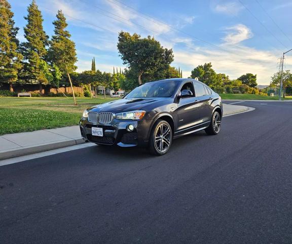 used 2016 BMW X4 car, priced at $13,450