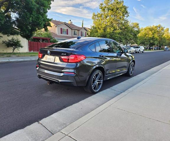 used 2016 BMW X4 car, priced at $13,450