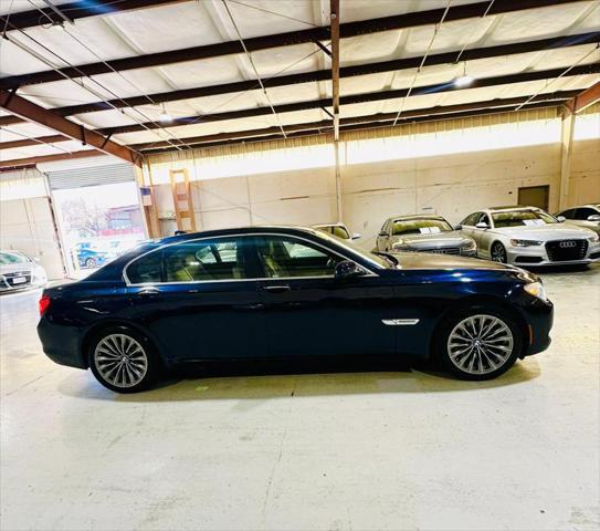 used 2012 BMW 750 car, priced at $10,999