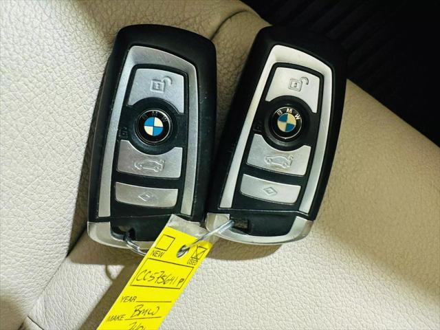 used 2012 BMW 750 car, priced at $10,999