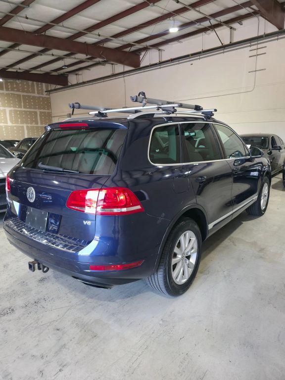 used 2014 Volkswagen Touareg car, priced at $8,499