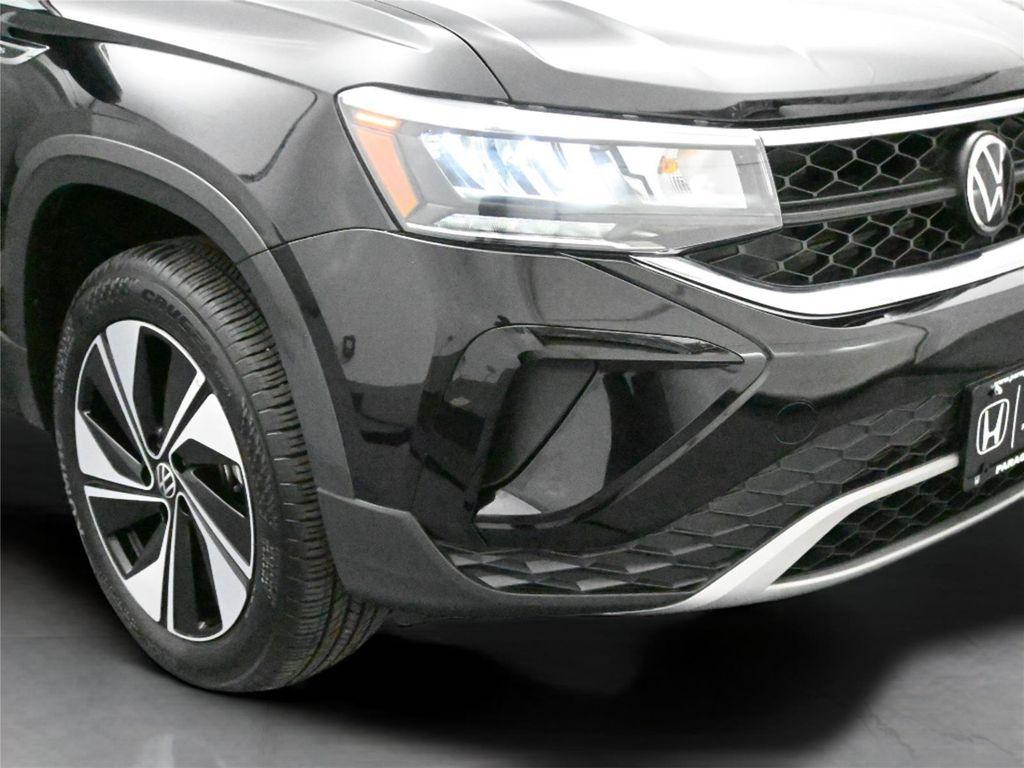 used 2024 Volkswagen Taos car, priced at $23,500