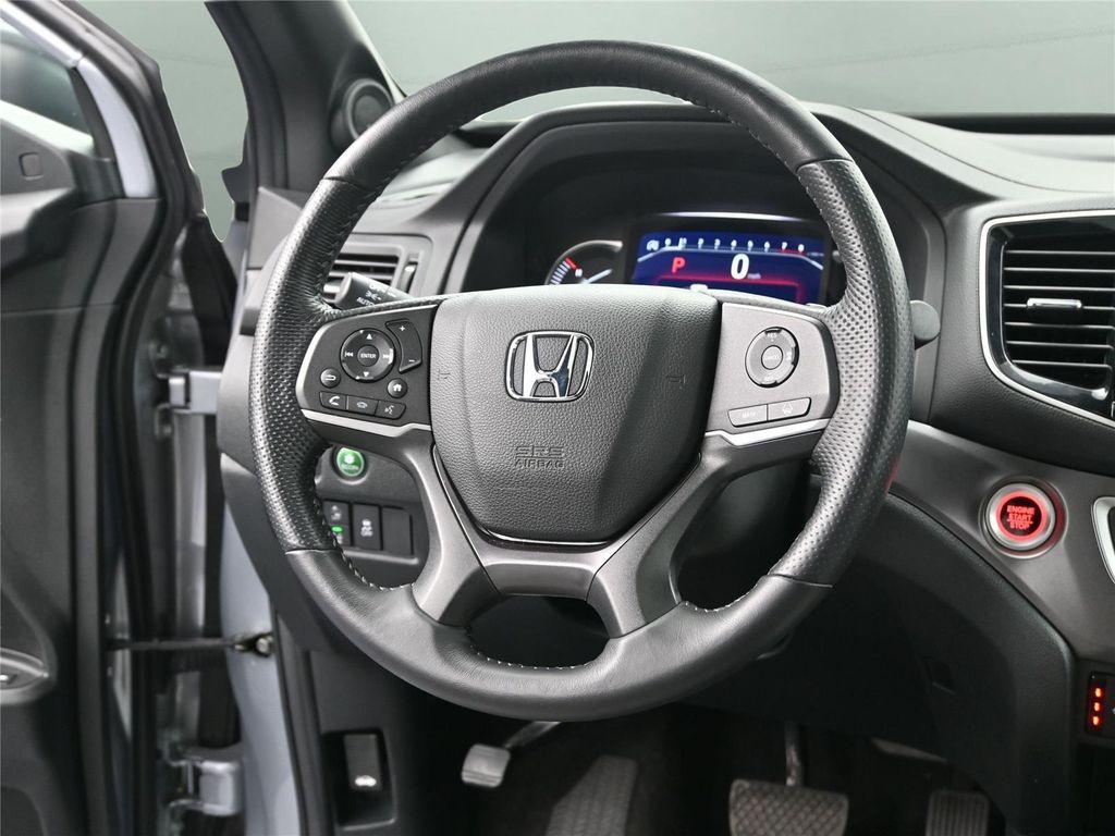 used 2023 Honda Passport car, priced at $28,200