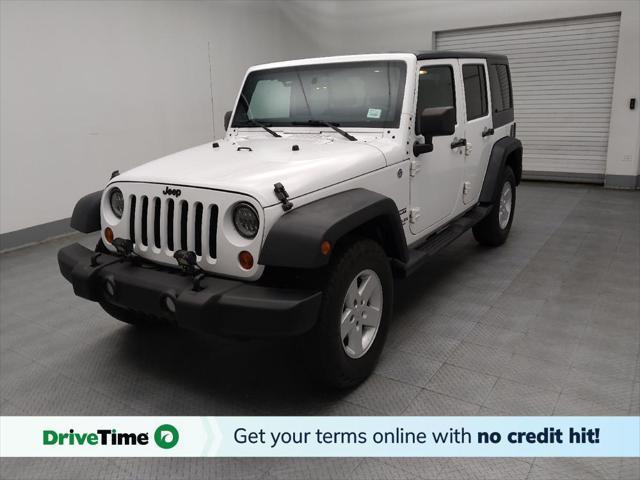 used 2013 Jeep Wrangler Unlimited car, priced at $22,095