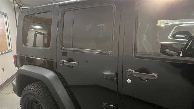 used 2009 Jeep Wrangler Unlimited car, priced at $12,995