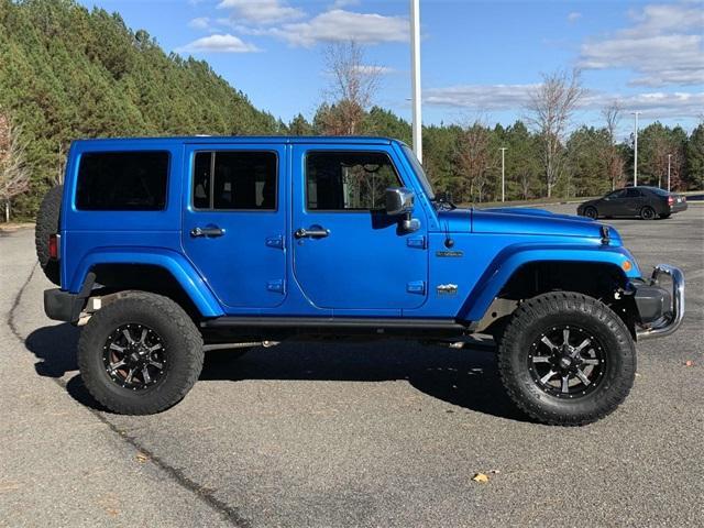 used 2014 Jeep Wrangler Unlimited car, priced at $25,575