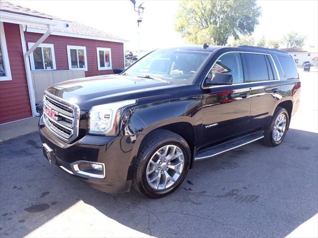 used 2015 GMC Yukon car, priced at $13,841