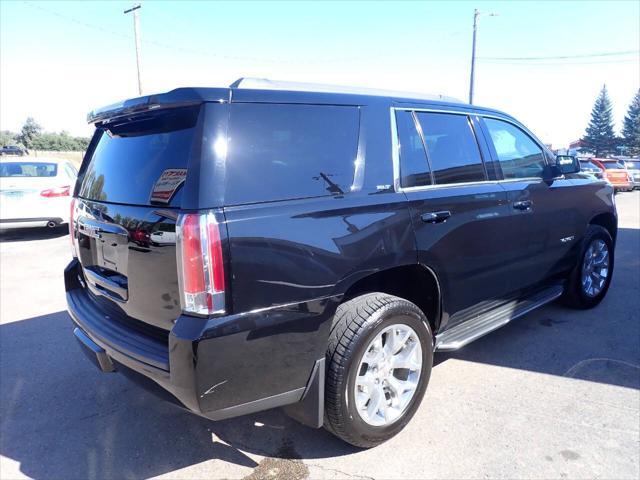 used 2015 GMC Yukon car, priced at $13,841