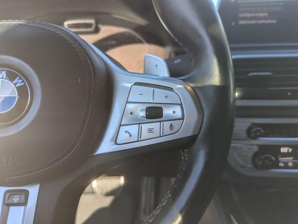 used 2022 BMW 750 car, priced at $47,598