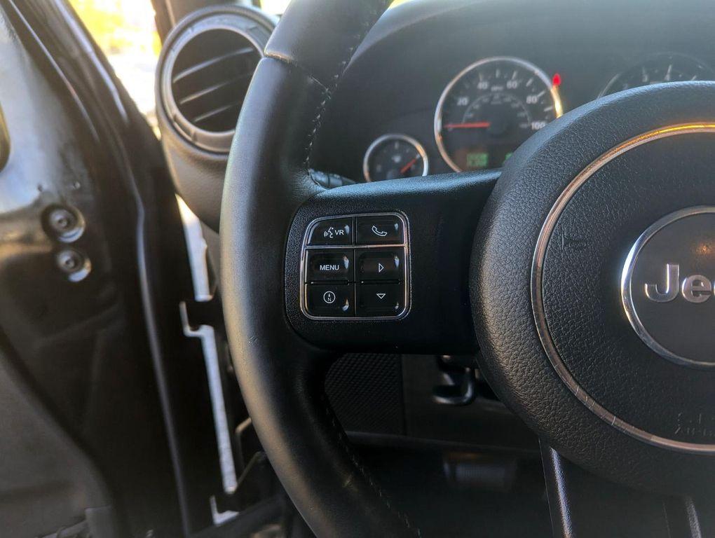 used 2015 Jeep Wrangler Unlimited car, priced at $16,998