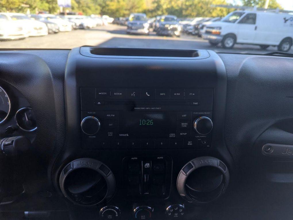 used 2015 Jeep Wrangler Unlimited car, priced at $16,998