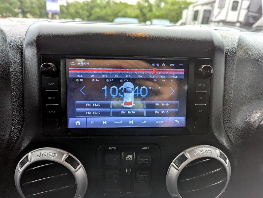 used 2015 Jeep Wrangler Unlimited car, priced at $16,998