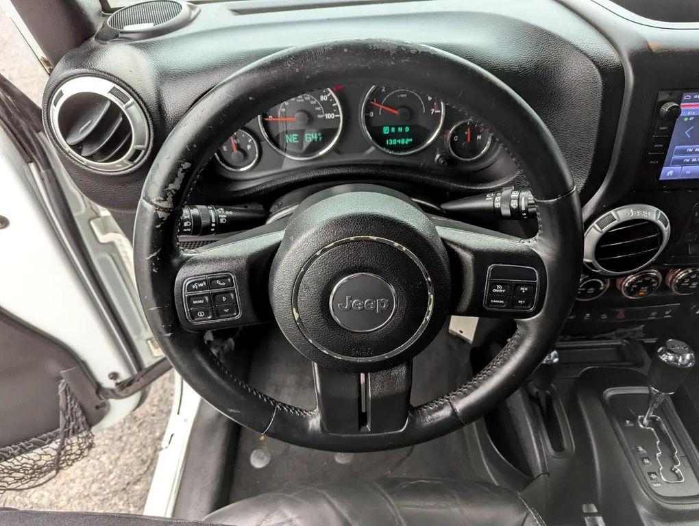 used 2015 Jeep Wrangler Unlimited car, priced at $16,998