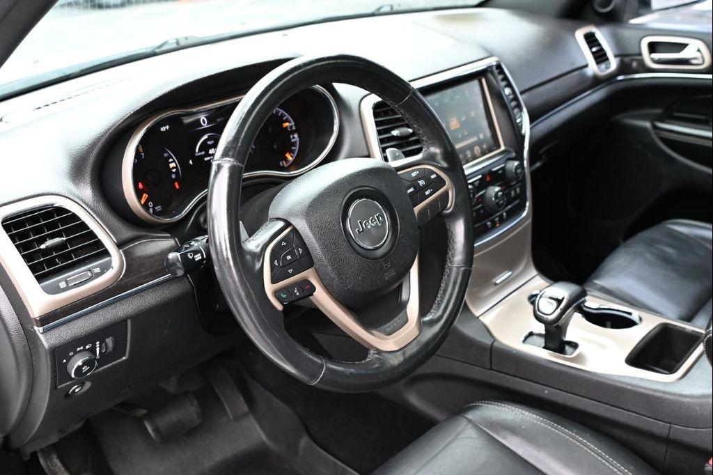 used 2015 Jeep Grand Cherokee car, priced at $9,998