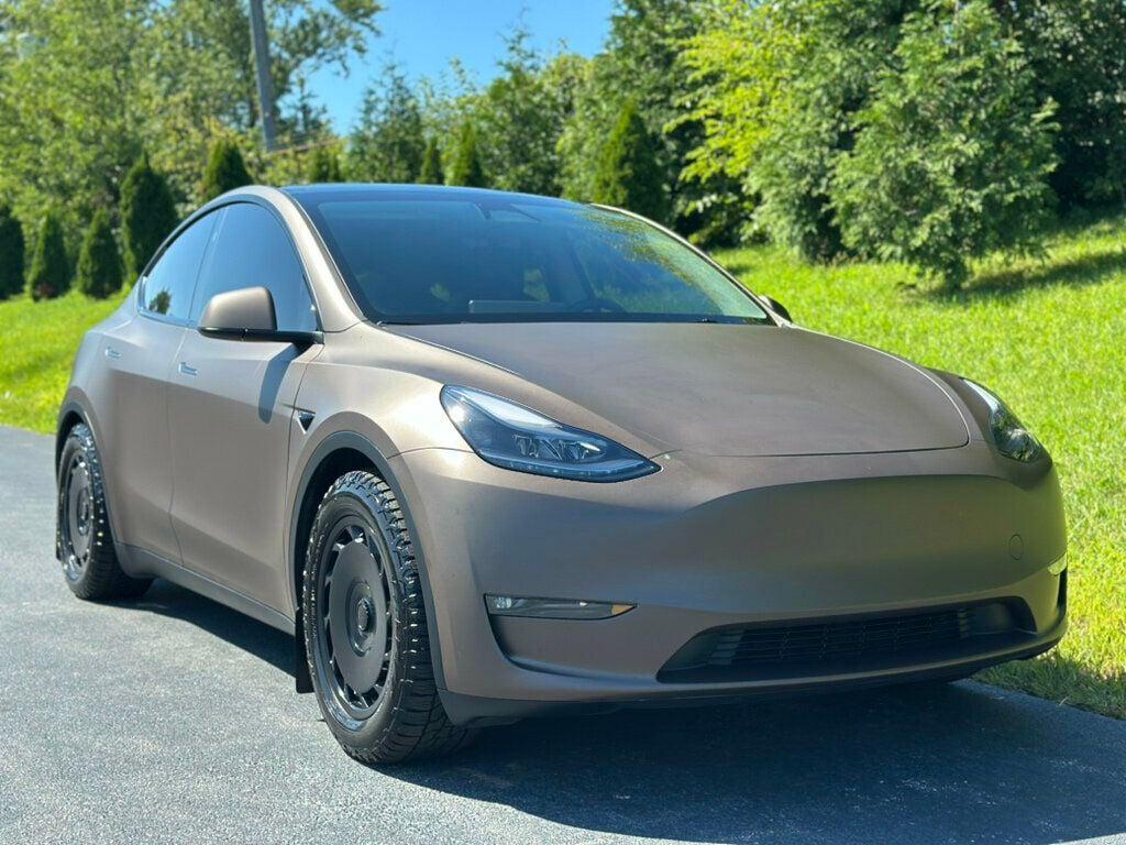 used 2023 Tesla Model Y car, priced at $35,980