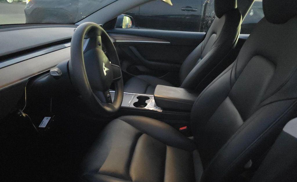 used 2023 Tesla Model 3 car, priced at $20,980