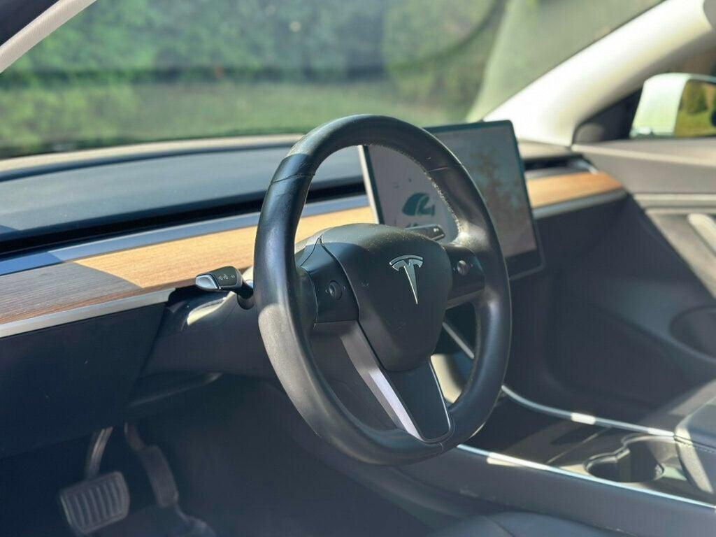 used 2018 Tesla Model 3 car, priced at $13,980