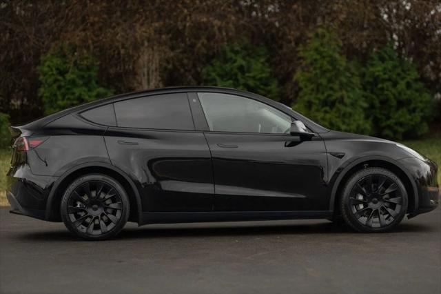 used 2022 Tesla Model Y car, priced at $27,980