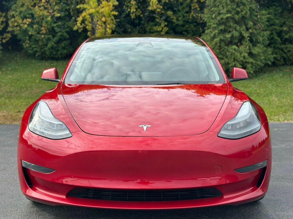 used 2023 Tesla Model 3 car, priced at $27,980