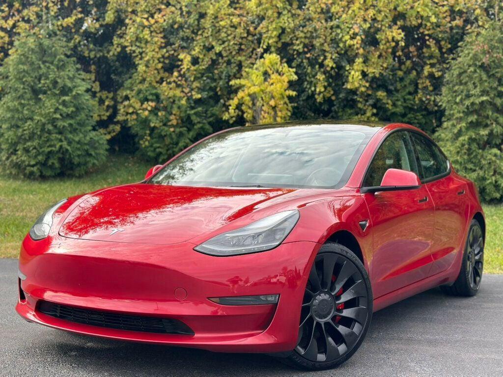 used 2023 Tesla Model 3 car, priced at $27,980