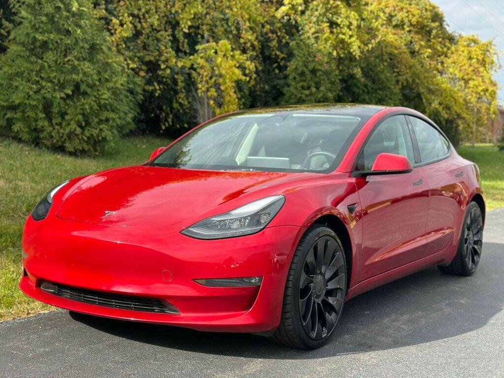 used 2023 Tesla Model 3 car, priced at $27,980