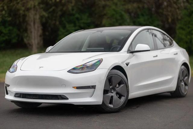 used 2023 Tesla Model 3 car, priced at $25,980