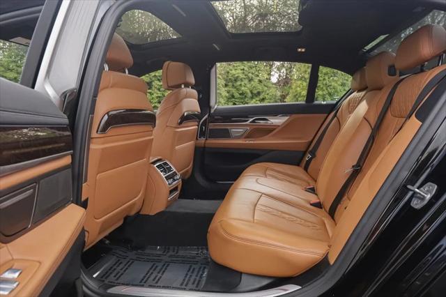 used 2022 BMW 740 car, priced at $50,980