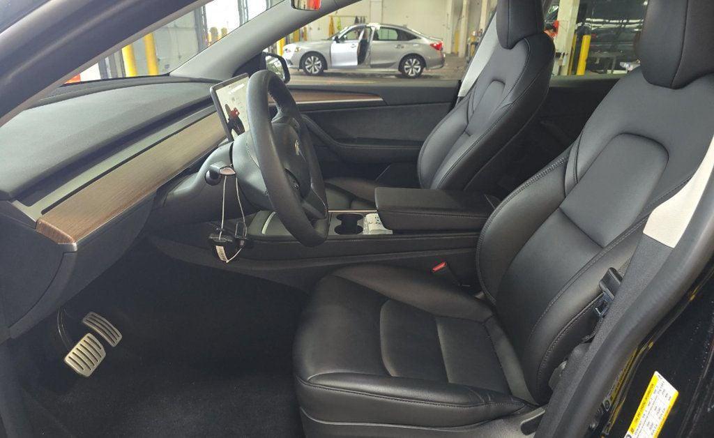 used 2023 Tesla Model Y car, priced at $27,980