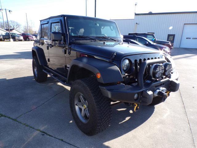 used 2014 Jeep Wrangler Unlimited car, priced at $15,995