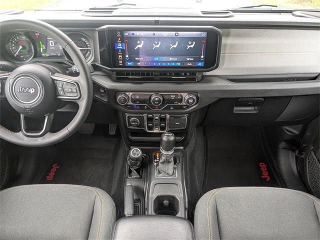 used 2024 Jeep Wrangler 4xe car, priced at $34,454