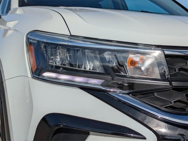 used 2024 Volkswagen Taos car, priced at $23,454
